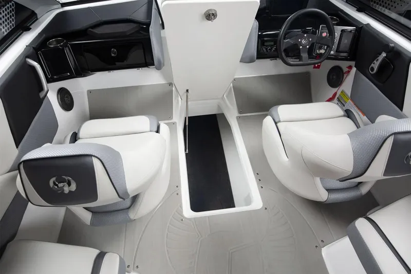 Slide: The Image of Manufacturer Provided Image: Interior of 2025 Scarab 235 SE with modern seating and control console. - 33
