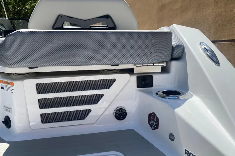 Slide: The Image of 2025 Scarab 235 SE boat interior with seating and control panel details. - 7