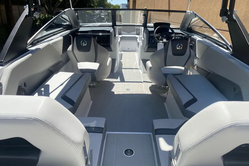 Slide: The Image of 2025 Scarab 235 SE boat interior with modern seating and sleek design. - 8