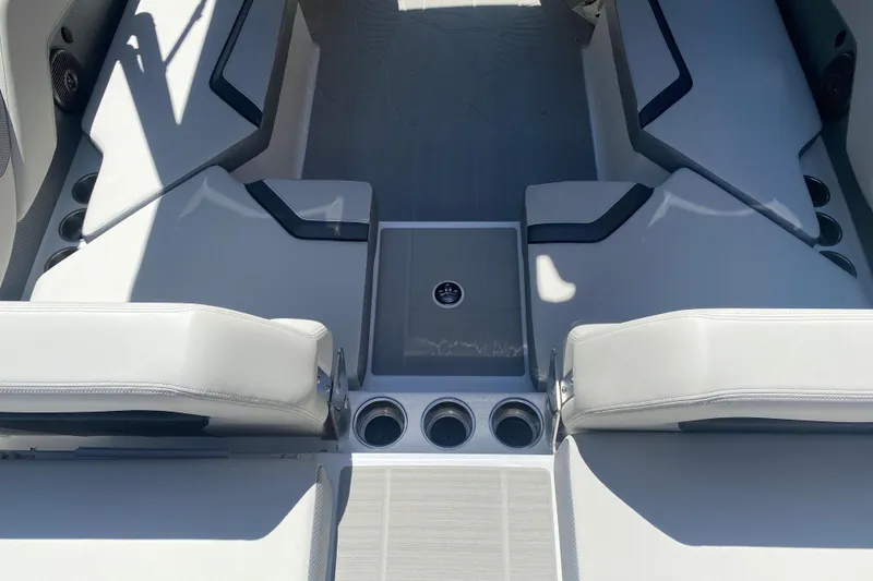 Slide: The Image of 2025 Scarab 235 SE boat interior with sleek seating and modern design. - 9