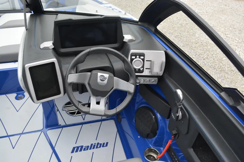 Slide: The Image of 2022 Malibu Wakesetter 23 LSV dashboard with modern controls and sleek design. - 13
