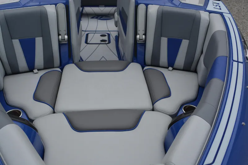 Slide: The Image of 2022 Malibu Wakesetter 23 LSV interior with blue and gray seating design. - 14