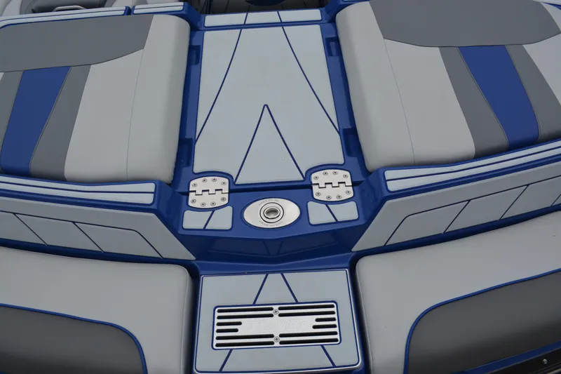 Slide: The Image of 2022 Malibu Wakesetter 23 LSV boat interior with blue and gray upholstery design. - 7