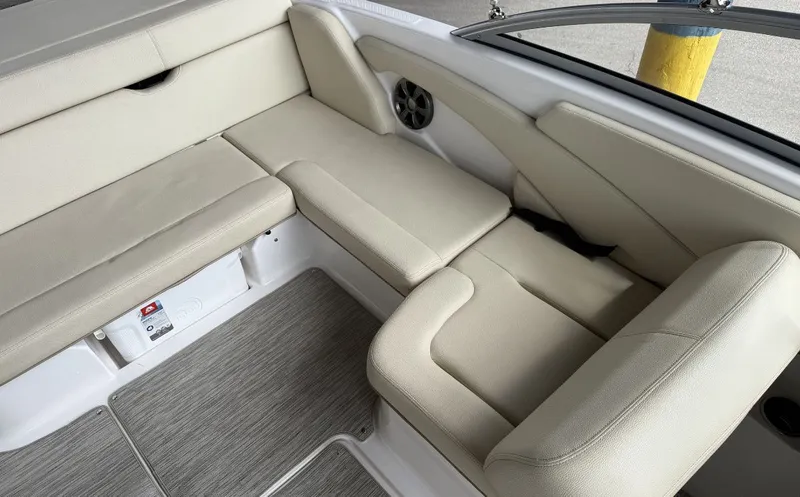 Slide: The Image of Interior of 2019 Regal 1900 ES Bowrider with beige seating. - 3