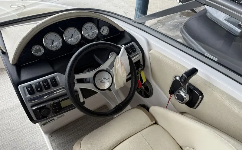 Slide: The Image of Interior view of 2019 Regal 1900 ES Bowrider cockpit. - 4
