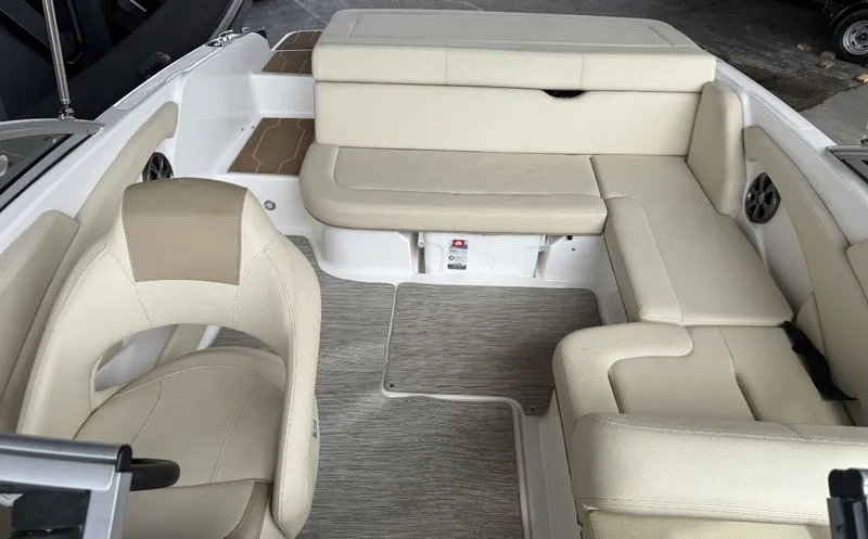 Slide: The Image of Interior of 2019 Regal 1900 ES Bowrider with beige seating. - 6