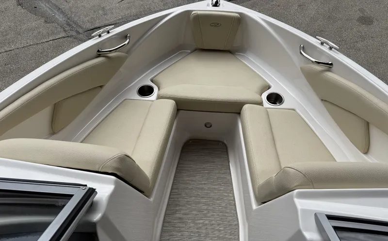 Slide: The Image of Interior view of 2019 Regal 1900 ES Bowrider with beige seating. - 7
