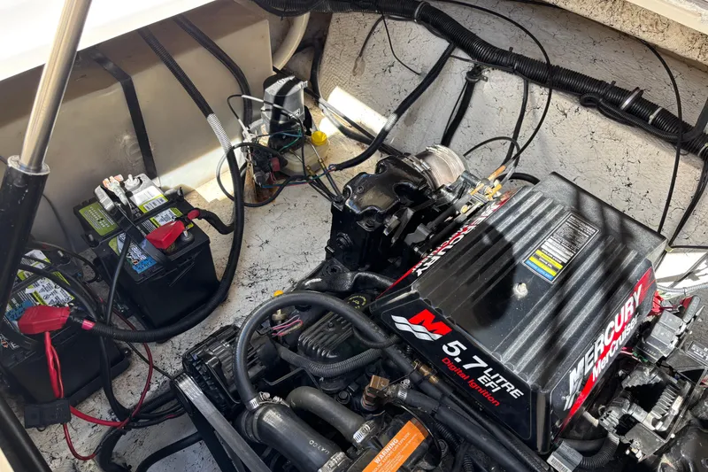 Slide: The Image of Engine compartment of a 2002 Rinker Fiesta Vee 270 with Mercury 5.7L engine. - 21