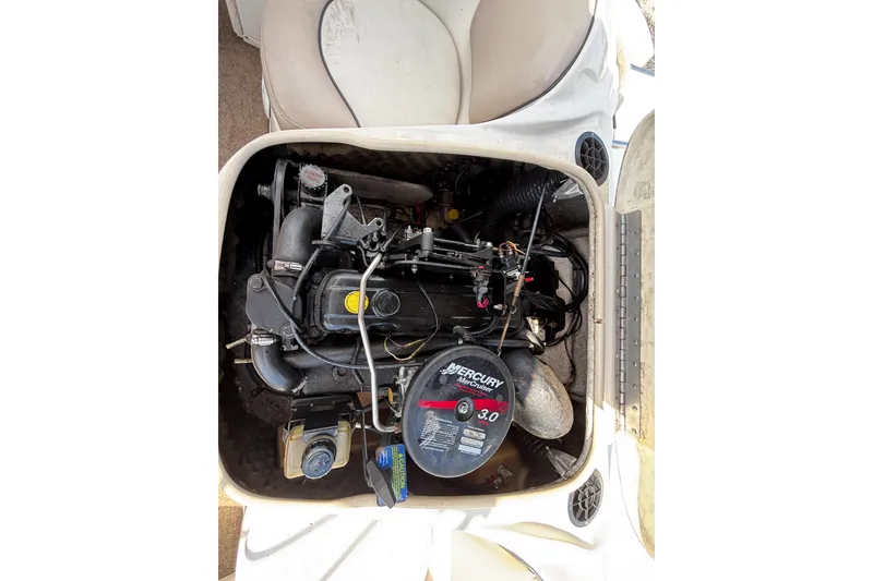 Slide: The Image of Engine compartment of a 2002 Sea Ray 176 Bow Rider with Mercury MerCruiser 3.0 engine. - 30