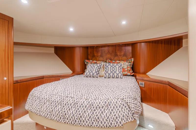 Slide: The Image of Luxurious bedroom interior of 2015 Ocean Alexander 72 Pilothouse yacht with elegant wood finish. - 15