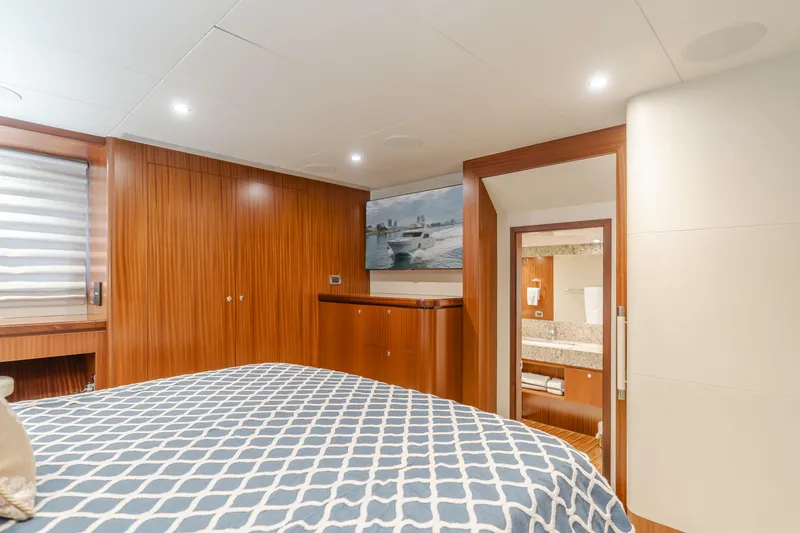 Slide: The Image of Luxurious bedroom interior of 2015 Ocean Alexander 72 Pilothouse yacht with ensuite bathroom. - 21