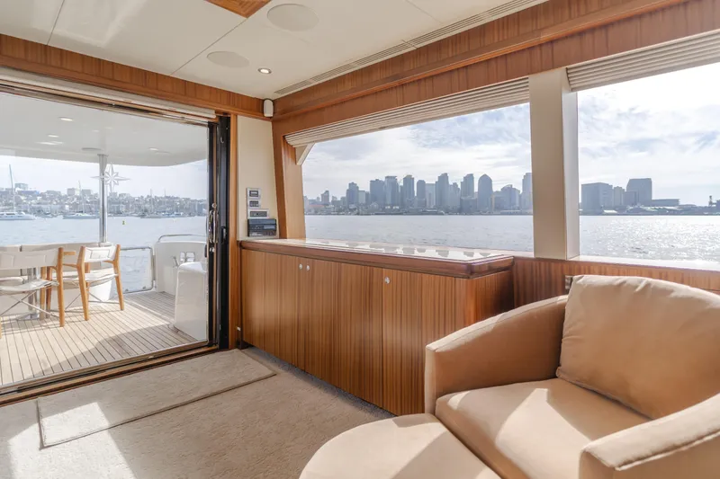 Slide: The Image of Luxurious interior of 2015 Ocean Alexander 72 Pilothouse yacht with city skyline view. - 27