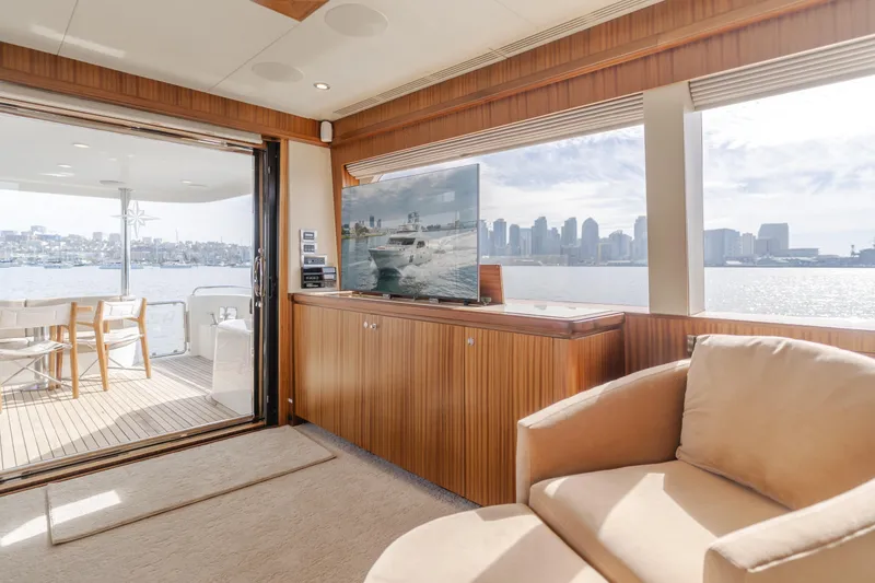 Slide: The Image of Luxurious interior of 2015 Ocean Alexander 72 Pilothouse yacht with city skyline view. - 28
