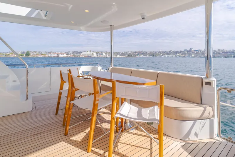 Slide: The Image of Luxurious deck of 2015 Ocean Alexander 72 Pilothouse yacht with seating and ocean view. - 32