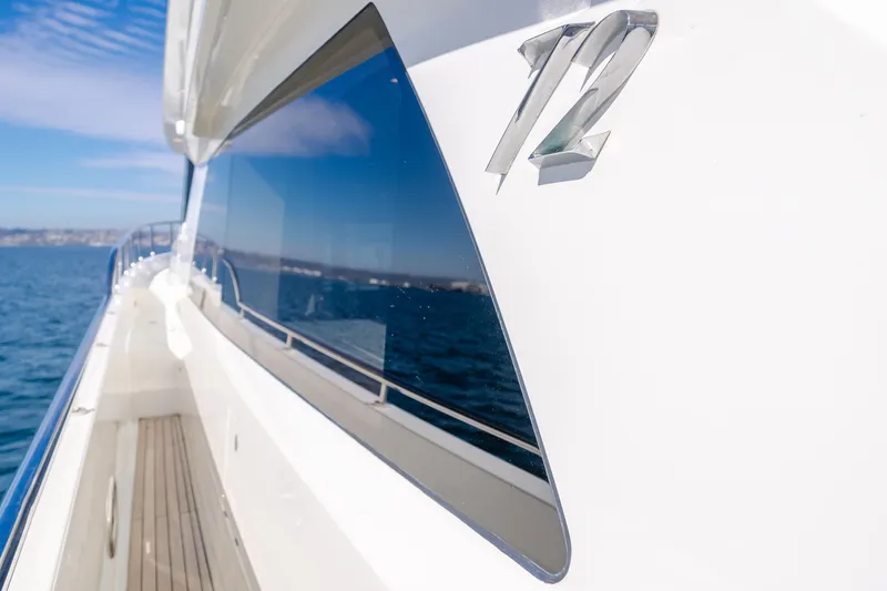 Slide: The Image of 2015 Ocean Alexander 72 Pilothouse yacht on open water, sleek design, reflective windows. - 39