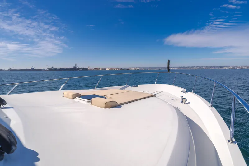 Slide: The Image of 2015 Ocean Alexander 72 Pilothouse yacht deck with ocean view and clear blue sky. - 40
