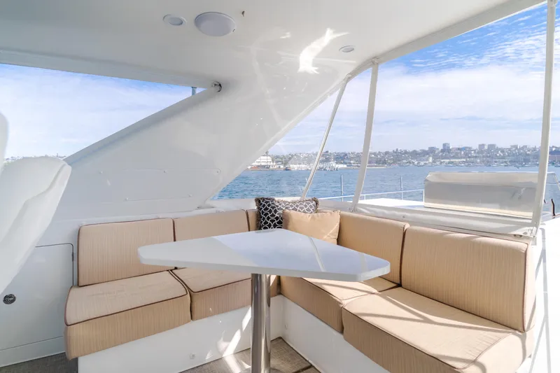 Slide: The Image of Luxurious seating area on 2015 Ocean Alexander 72 Pilothouse yacht with ocean view. - 44