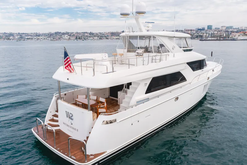 Slide: The Image of Luxury 2015 Ocean Alexander 72 Pilothouse yacht on calm waters, featuring elegant design. - 5