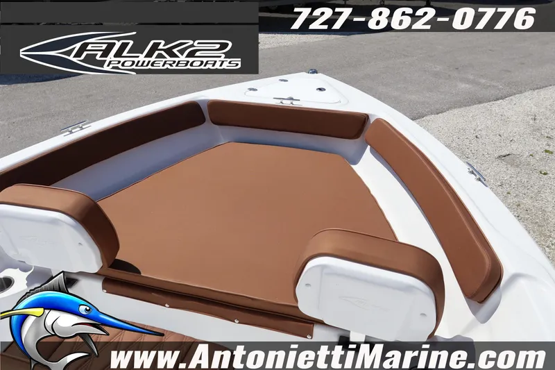 Slide: The Image of 2026 ALK2 Powerboats 18 CRS Center Console with brown seating, contact info, and website displayed. - 10