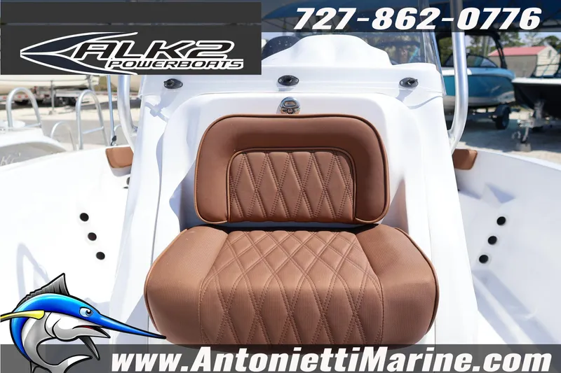 Slide: The Image of 2026 ALK2 Powerboats 18 CRS Center Console with brown cushioned seating. - 11