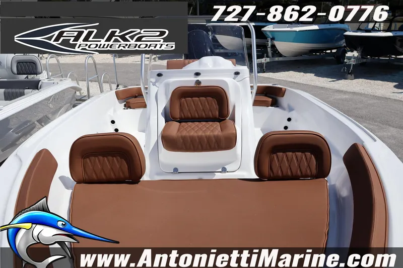 Slide: The Image of 2026 ALK2 Powerboats 18 CRS Center Console with brown seating, displayed at Antonietti Marine. - 4