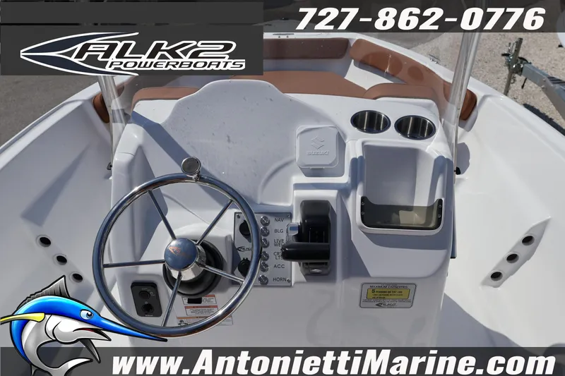 Slide: The Image of Center console of 2026 ALK2 Powerboats 18 CRS with steering wheel and controls. - 8