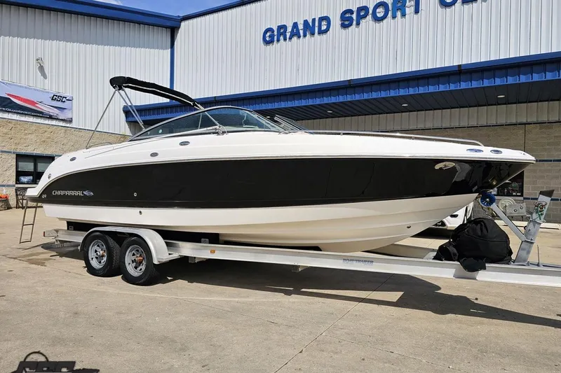 Slide: The Image of 2007 Chaparral 256 SSi boat on trailer outside Grand Sport Center. - 13