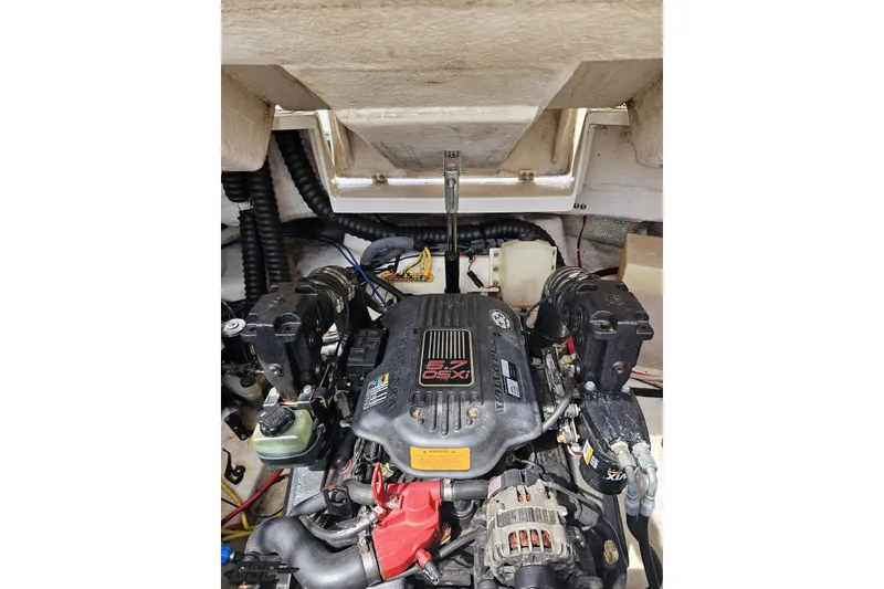 Slide: The Image of Engine compartment of a 2007 Chaparral 256 SSi boat, featuring a 5.7 GXI engine. - 96