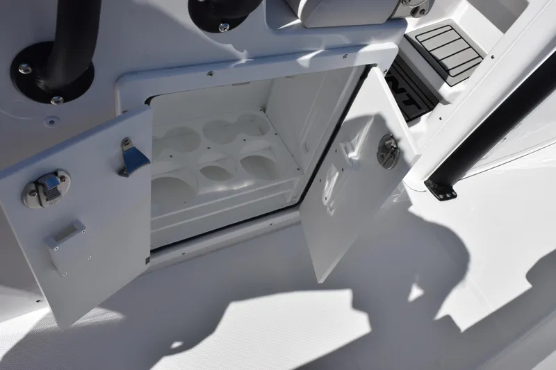 Slide: The Image of Open storage compartment on 2026 Sea Hunt Ultra 275 SE boat. - 21