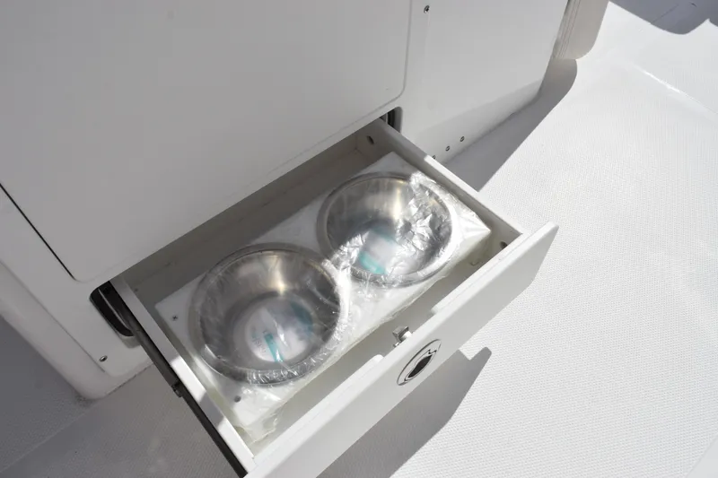 Slide: The Image of Drawer with stainless steel bowls on 2026 Sea Hunt Ultra 275 SE boat. - 19