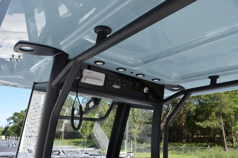 Slide: The Image of 2026 Sea Hunt Ultra 275 SE boat console with electronics and sturdy framework. - 9