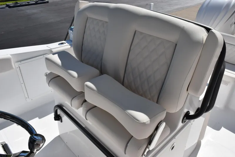 Slide: The Image of Luxury seating on 2026 Sea Hunt Ultra 275 SE boat, featuring plush, diamond-stitched upholstery. - 10