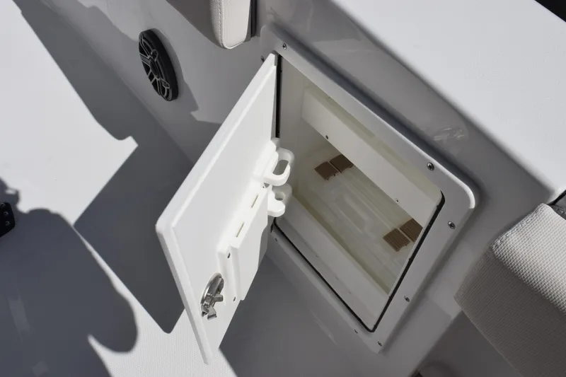 Slide: The Image of Open storage compartment on 2026 Sea Hunt Ultra 275 SE boat deck. - 22