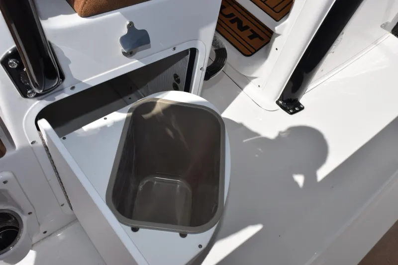 Slide: The Image of Storage compartment on 2026 Sea Hunt Ultra 265 SE boat, featuring sleek design and functionality. - 21