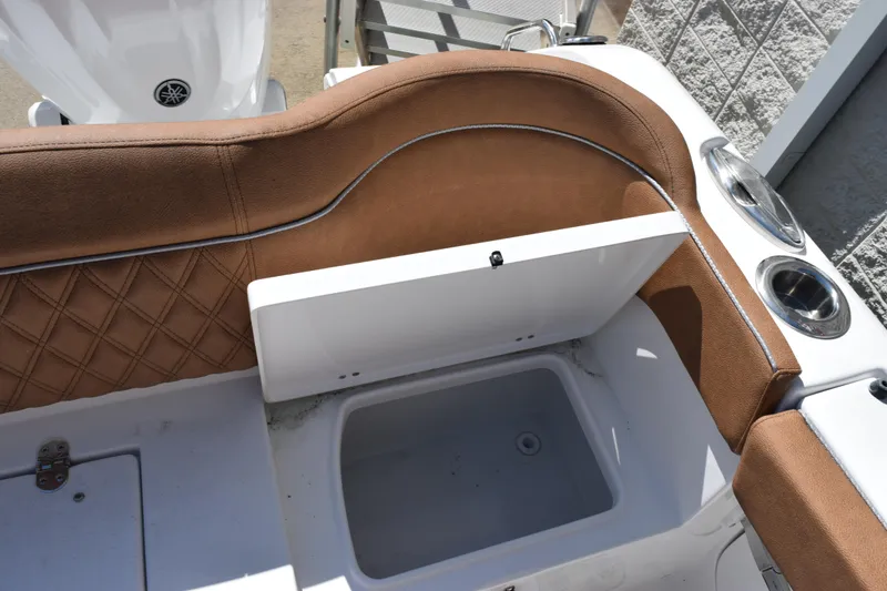 Slide: The Image of Interior view of 2026 Sea Hunt Ultra 265 SE boat with storage compartment. - 23