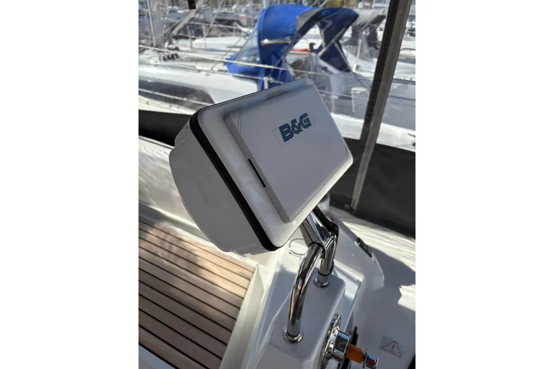 Slide: The Image of B&G navigation system on 2023 Beneteau Oceanis 34.1 yacht, featuring sleek design and advanced technology. - 18