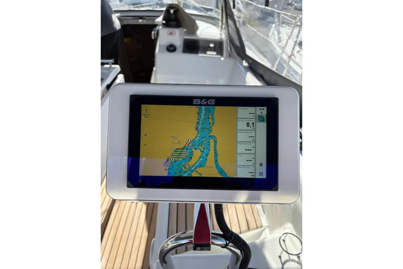 Slide: The Image of B&G navigation display on 2023 Beneteau Oceanis 34.1 yacht, showing detailed marine chart. - 19
