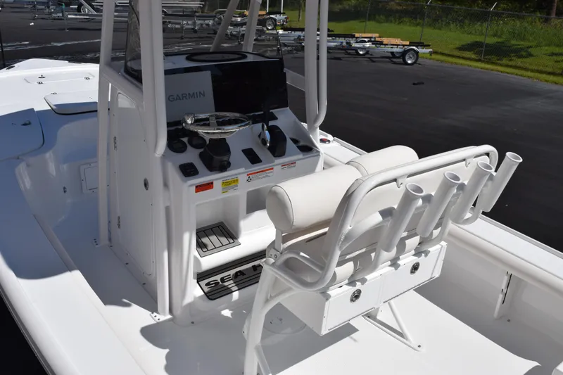 Slide: The Image of 2026 Sea Hunt BX 22 BR boat console with Garmin navigation system and rod holders. - 7