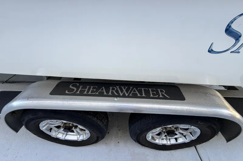 Slide: The Image of Trailer with ShearWater branding, featuring dual wheels, model x22, year 2023. - 10
