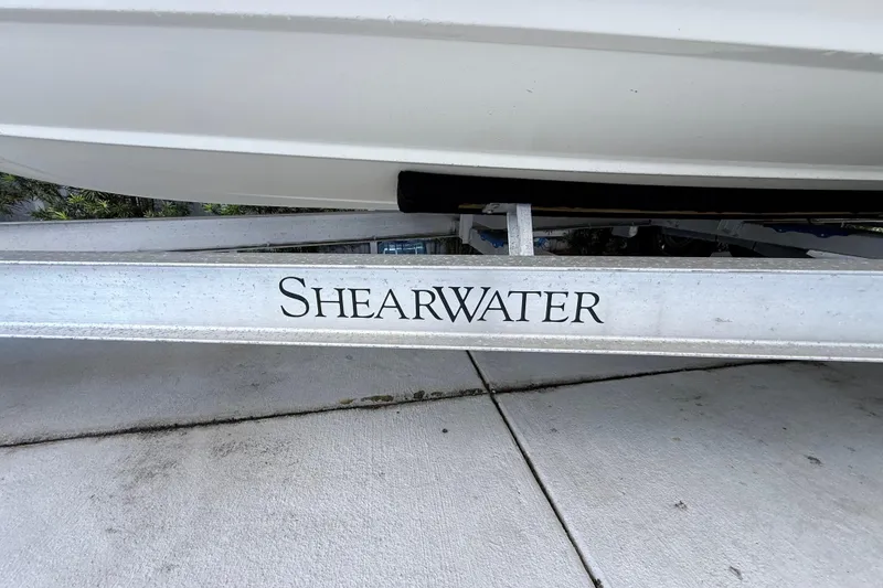 Slide: The Image of Trailer for 2023 ShearWater x22 boat on concrete surface. - 12
