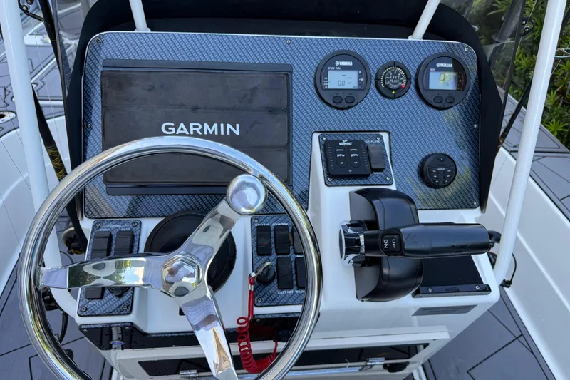 Slide: The Image of Control panel of 2023 ShearWater x22 boat with Garmin navigation system. - 29