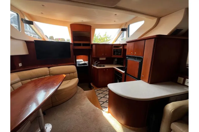 Slide: The Image of Luxurious interior of a 2004 Silverton 43 Motor Yacht with modern amenities. - 10