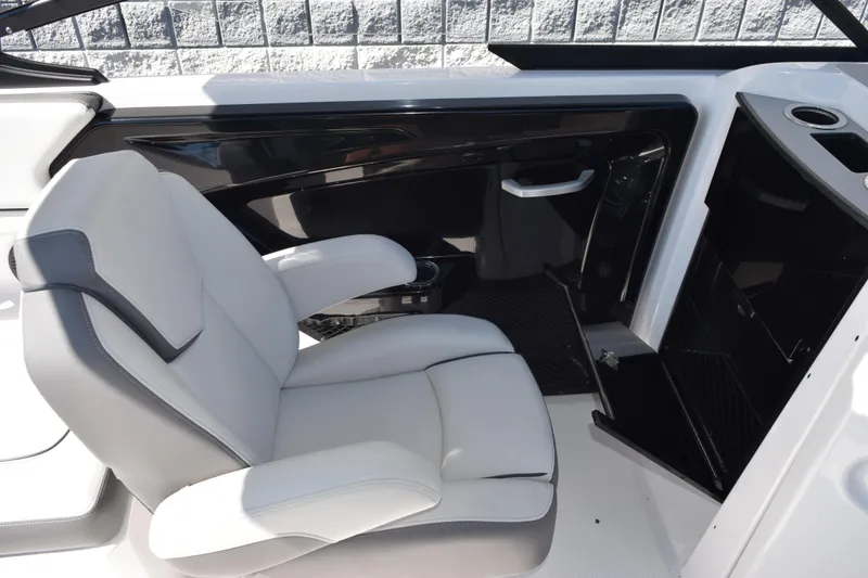 Slide: The Image of 2024 Yamaha Boats AR250 interior with sleek seating and modern design. - 10