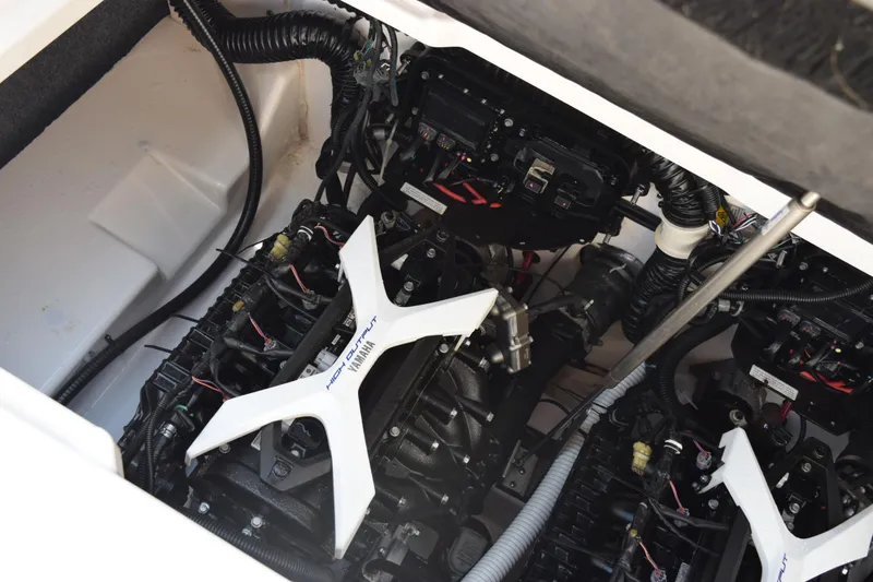 Slide: The Image of Engine compartment of 2024 Yamaha Boats AR250, showcasing high-output engines and components. - 23