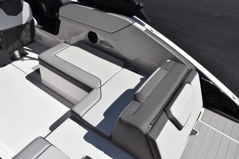 Slide: The Image of 2024 Yamaha Boats AR250 interior seating with sleek, modern design and comfortable upholstery. - 8