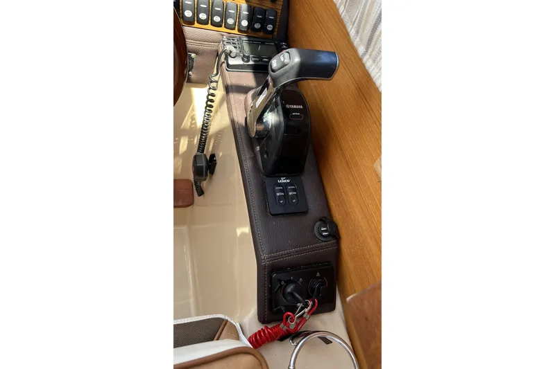 Slide: The Image of Control panel of a 2018 Ranger Tugs R-23 boat with Yamaha throttle. - 24