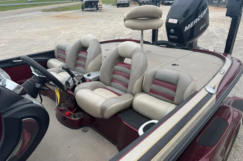 Slide: The Image of 2009 Nitro Z-9 CDC boat interior with plush seating and Mercury engine. - 6