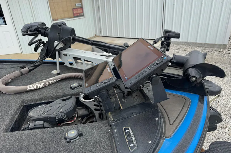 Slide: The Image of 2022 Nitro Z19 boat dashboard with dual Lowrance fish finders and trolling motor. - 13