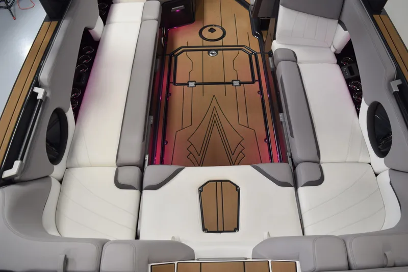 Slide: The Image of Luxurious interior of 2021 Supra SE 450 boat with stylish seating and elegant flooring design. - 18