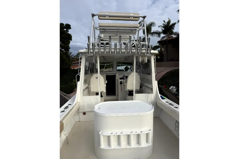 Slide: The Image of 2023 Steiger Craft 31 Fisherman boat interior with seating and fishing rod holders. - 3